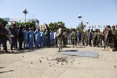 Soldiers stand guard next to men convicted of involvement in the 2018 killing of top Houthi leader Saleh al-Samad before their execution at Tahrir Square in Sanaa, Yemen in September 2021 - source: Reuters