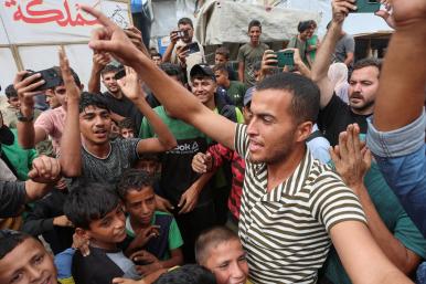 Palestinians celebrate news of a ceasefire between Israel and Hamas in October 2025 - source: Reuters