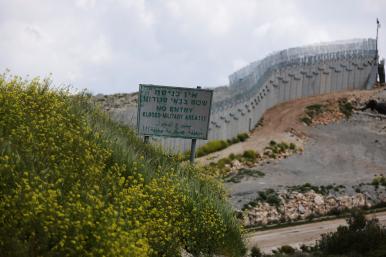 A sign and barrier along the Israel-Lebanon border - source: Reuters