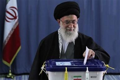 Iran's supreme leader, Ayatollah Ali Khamenei, casts his vote for president