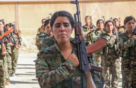 SDF fighters train at a US Army base in Syria