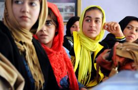 Afghan women attend a photography class, 2013.