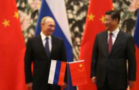 Russian President Vladimir Putin meets Chinese President Xi Jinping at a summit in Beijing - source: Reuters