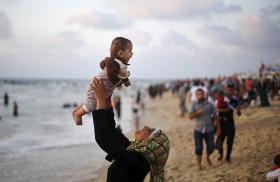 Palestians on a Mediterranean beach in Gaza