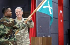 Turkish official Hulusi Akar with Somali soldier