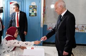 President Kais Saied of Tunisia casts a vote in the July 2022 constitutional referendum.