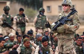 U.S. soldier trains Iraqis at Camp Taji