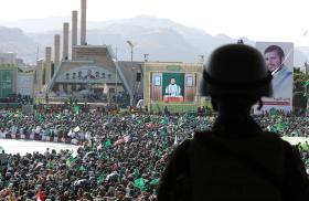 Houthi leader Abdul-Malik Badruddin al-Houthi addresses a rally in Sanaa, Yemen - source: Reuters