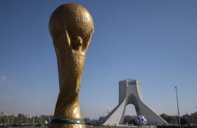 A statue of the men's FIFA World Cup trophy on display in downtown Tehran, Iran - source: Reuters