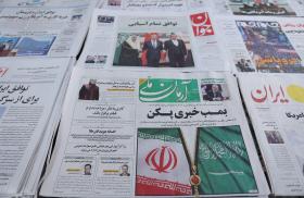 Newspapers at a shop in Tehran display headlines about the China-brokered Iran-Saudi deal in March 2023 - source: Reuters