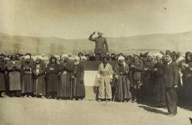 Qazi Muhammed salutes at the founding of the Kurdish Republic of Mahabad in 1946 - source: Wikimedia Commons