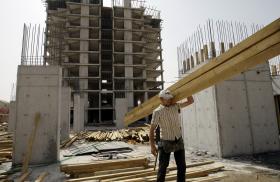 Photo of a worker at a construction site in Iraqi Kurdistan.