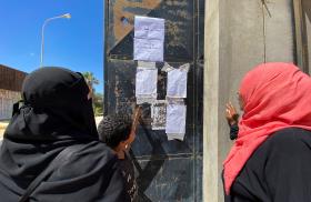 People look at the list of missing people, in the aftermath of the floods in Derna, Libya - source: Reuters