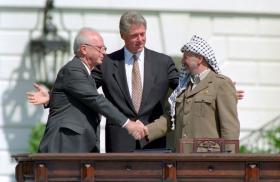 Israeli PM Yitzakh Rabin and PLO Chairman Yasser Arafat shake hands
