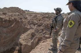 U.S. soldier and member of SDF