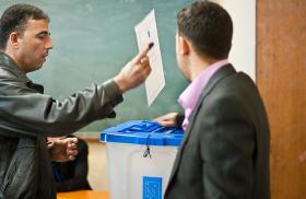 Iraqi citizens at the ballot box