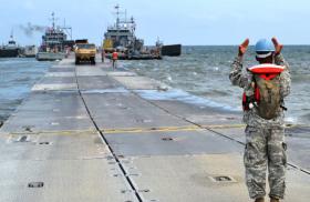 U.S. Army personnel prepare a temporary floating pier to deliver aid to Gaza - source: Department of Defense