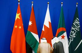 Delegates and flags at the 2018 China-Arab Forum - source: Reuters