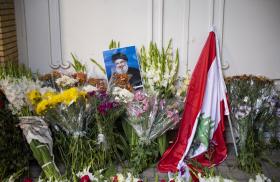 Flowers and a portrait of Hassan Nasrallah at a memorial to the slain Hezbollah leader in Beirut - source: Reuters