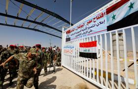 Security forces the Iraqi-Syrian border, after it has been reopened for trade and travel, in Al Qaim, Iraq in 2019 - source: Reuters