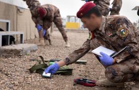 A soldier from Iraq's Counter Terrorism Service participates in a joint training exercise with U.S. colleagues - source: U.S. Department of Defense