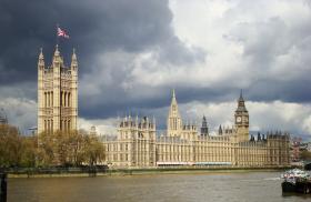 A view of the Palace of Westminister from across the River Thames, with the Victoria Tower and the House of Lords in the foreground - source: Wikimedia Commons