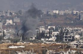 Smoke from an explosion across the Israeli border in Gaza, May 2025.