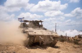 An IDF tank flies the Israeli flag while on operation inside Gaza in 2025 - source: IDF
