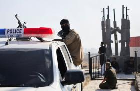 Bedouin fighters stopped at a government checkpoint near Suwayda in July 2025 - source: Reuters