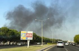 Photo of smoke rising over Doha following an Israeli strike in September 2025.