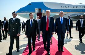 U.S. President Trump walks with Israeli President Herzog and Prime Minister Netanyahu after arriving in Israel - source: The White House
