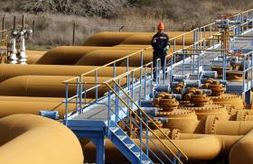 A worker inspects oil pipes near Turkey's Mediterranean Coast - source: Reuters