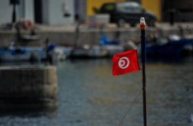A Tunisian flag flies at the port of Bizerte - source: Reuters