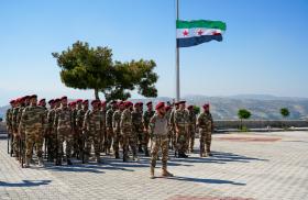 Syrian Army recruits attend their graduation ceremony from special forces training - source: Reuters