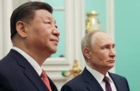 Close-up photo of Chinese leader Xi and Russian leader Putin.