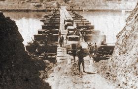 Egyptian troops cross a makeshift bridge over the Suez Canal in 1956 - source: Wikimedia Commons