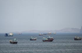 Ships and boats await passage in the Persian Gulf - source: Reuters