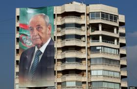 Photo of a large banner on a building in Lebanon showing Speaker of Parliament Nabih Berri.
