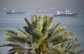 Ships gather in waters off the Iranian island of Bandar Abbas along the Strait of Hormuz - source: Reuters