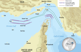Map showing Iranian, Omani, and international shipping routes in the Strait of Hormuz.