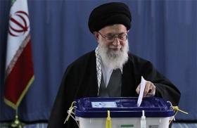 Iran's supreme leader, Ayatollah Ali Khamenei, casts his vote for president