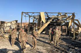 U.S. soldiers at an Iraqi base after a rocket attack by Iran-backed militias