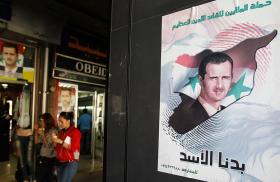 A pro-Assad election poster in Syria