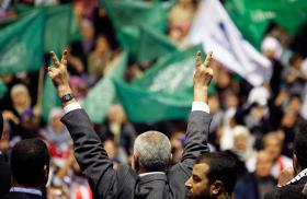 Hamas leader Ismail Haniyeh gestures to supporters